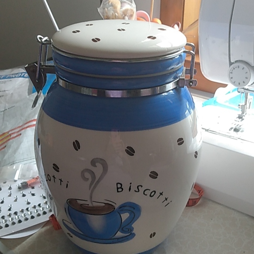 Biscotti/Cookie jar with air tight attached lid. 10" tall. 23" in diameter.